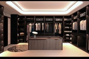 Mirrors, Glass Shelves, and Lighting Can Make All the Difference for a Walk-In Closet